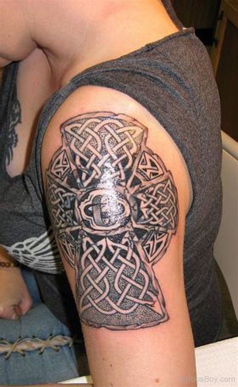 This is a wooden cross tattoo which is held by hand as a show demonstrating your love for christ. Awesome Cross Tattoo On Shoulder | Tattoo Designs, Tattoo ...