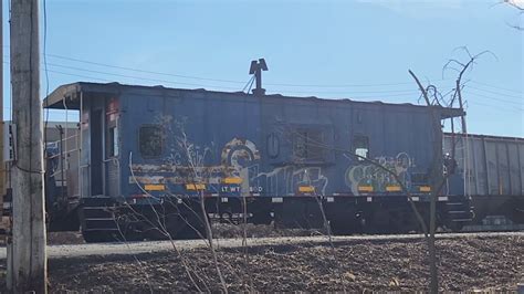 Norfolk Southern Switching In Dillerville Yard With Old Conrail Caboose