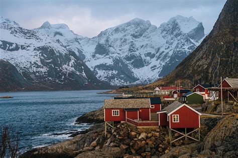 Reine Fishing Village With Snow Capped Mountains Norway Digital Art By