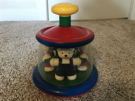 Ted N Tess Carousel By Ambi Toys In 2021 Einstein Toys Baby