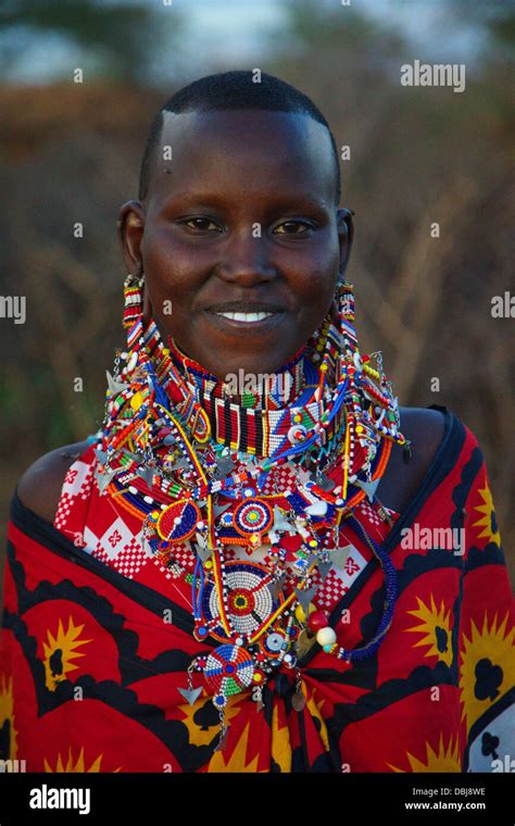 Portrait Of Masai Woman In Traditional Clothing And Jewelry Ol Kinyei