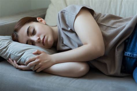 3 300 Bildbanksfoton Bilder Och Royaltyfria Bilder Med Girl Sleeping On Couch Istock