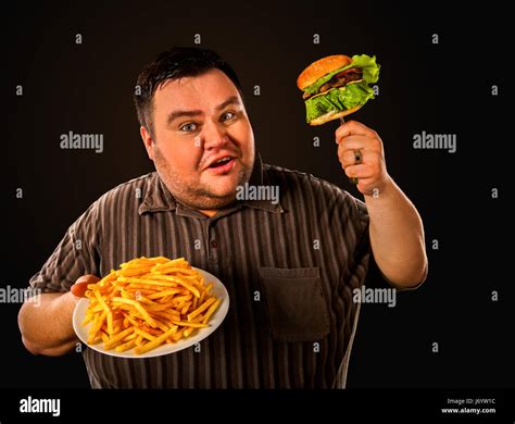 Fat Man Eating Fast Food Hamberger Breakfast For Overweight Person