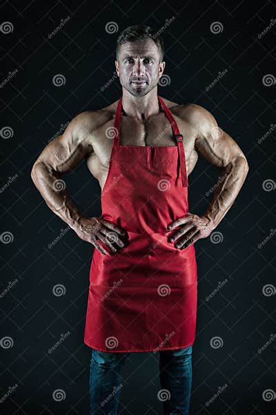 Man Cook Man With Muscular Torso In Chef Apron Cuisine Male Housewife Husband In Kitchen