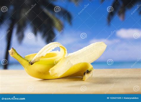 Fresh Yellow Banana With Palm Beach Behind Stock Image Image Of Ripe