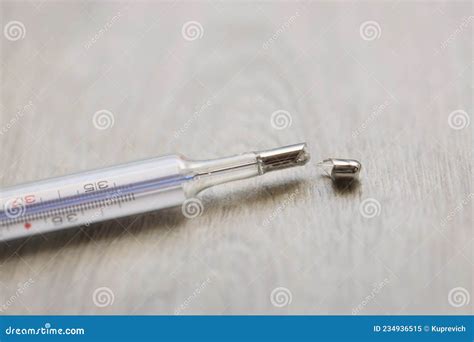 Broken Glass Mercury Thermometer Lying On Floor Stock Image Image Of