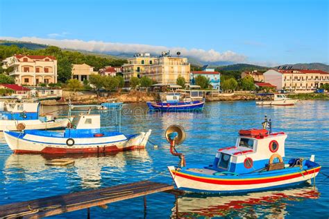 Colourful Greek Fishing Boats Mooring In Port At Sunrise Time On Samos