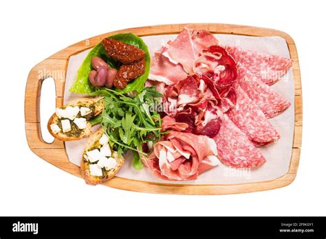 Traditional Tuscan Antipasto Platter With Cold Cuts And Dried Tomatoes