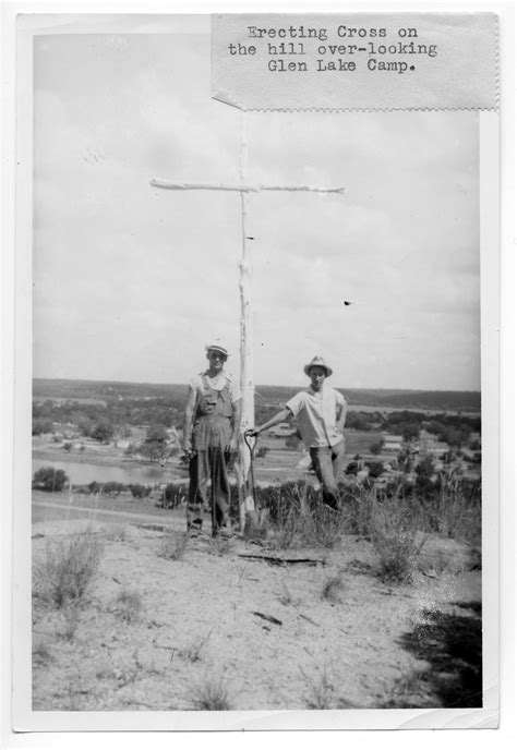 Two Men Erecting A Wooden Cross Near Glen Lake Camp The Portal To