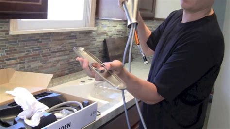 In redoing our kitchen, we opted for quartz countertops and sink. How to install a Kitchen Faucet Step-by-Step - YouTube
