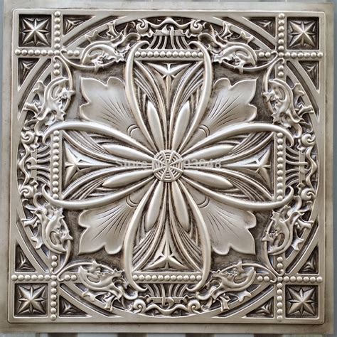 Faux tin ceiling tiles add an aesthetic dimension to a room, giving it warmth and character. PL10 faux tin plastic ceiling tiles antique white color 3D ...