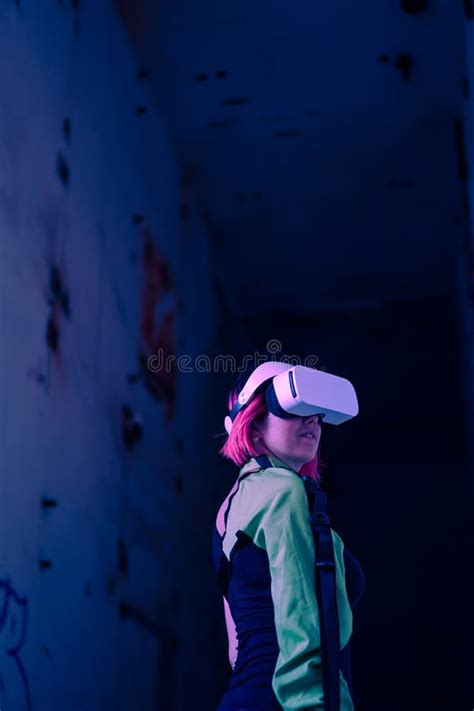 Woman Goes Into Virtual Reality Using Virtual Reality Headset Stock