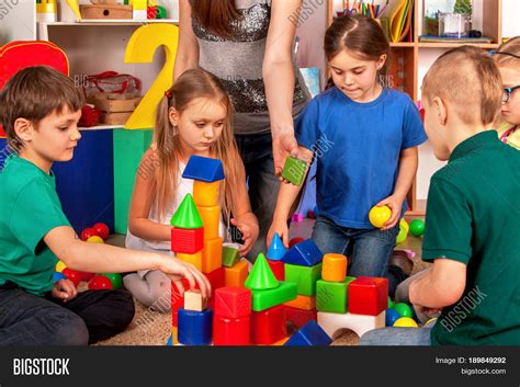 Children Playing With Building Blocks