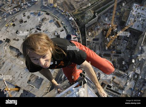 An Urban Climber Alain Robert Nicknamed Spiderman Climbing On Top The