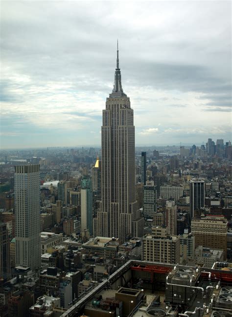 Empire state building height, including the broadcast tower, is 1,453 feet, 8 9/16 inches. Empire State Building - The Skyscraper Center
