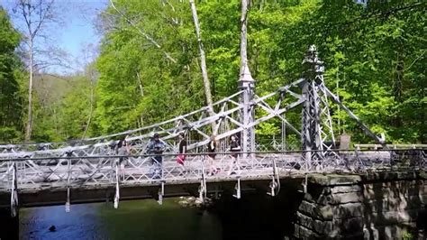 Lucky hikers will see frogs, turtles, heron and ducks along the lake shorts and small islands. Mill Creek Suspension Bridge Youngstown Ohio - YouTube