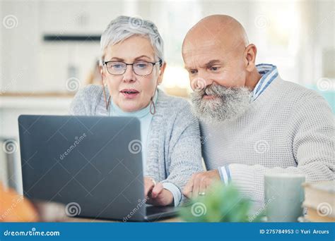 Laptop Senior Couple And Typing In Home Internet Browsing Or Social