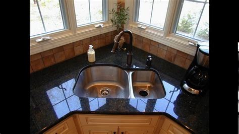 Make a statement with rounded cabinetry. Corner kitchen sink cabinet designs - YouTube