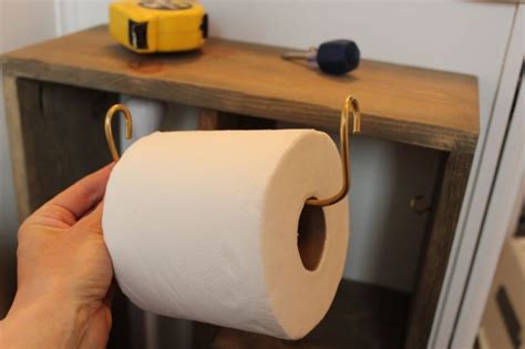 Now, to actually start your brass toilet paper holder, begin by wrapping one end of your brass wire in the towel. Inspirational Bathroom Design Ideas and Pictures