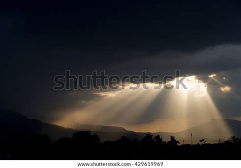 Rays Light Shining Through Dark Clouds Stock Photo Edit Now 429619969