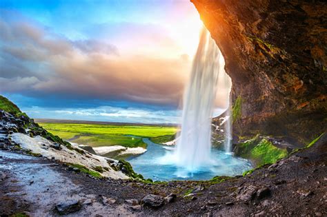 Seljalandsfoss Waterfall During The Sunset Beautiful Waterfall In Iceland Stock Photo Download