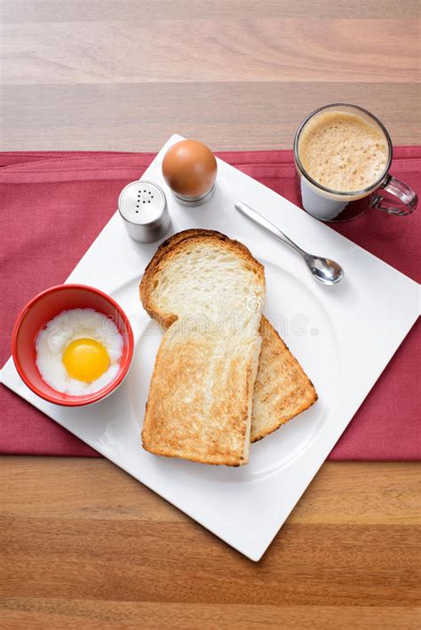 Breakfast With Coffee Toast Bread And Half Boiled Egg Stock Image