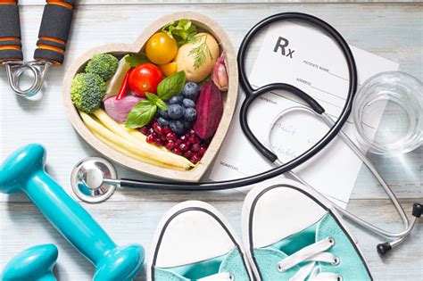 Healthy Lifestyle Concept With Diet Fitness And Medicine Stock Photo
