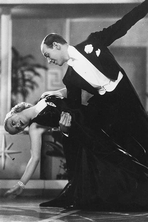 Astaire unwound (ceiling dance from royal wedding). Ginger Rogers and Fred Astaire dancing in a scene from the ...