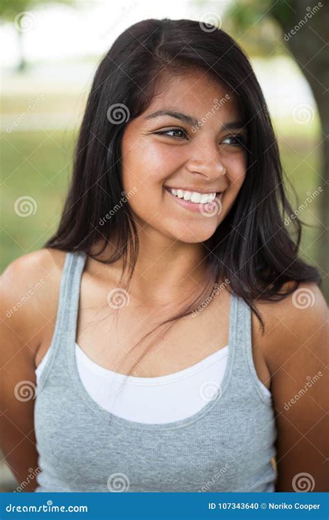 Young Hispanic Girl Smiling Outside Stock Photo Image Of Teenager