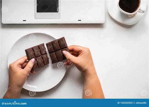 Woman Eating Chocolate And Coffee At Workplace Stock Image Image Of