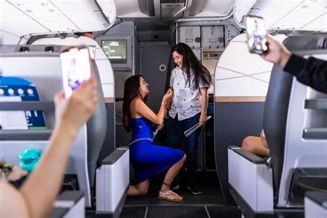Flight Attendant Surprises Pilot Girlfriend With A Proposal In The Sky