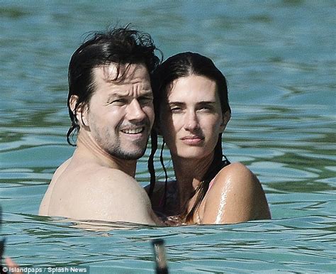 mark wahlberg keeps wife rhea durham entertained as he plays beach football daily mail online