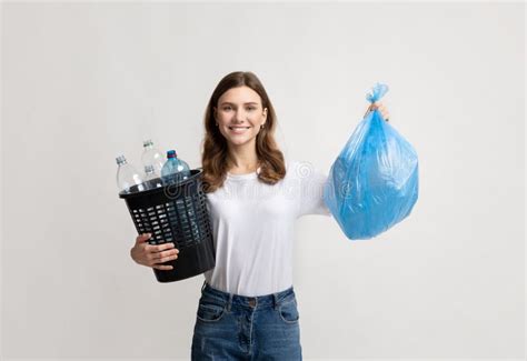 653 Woman Holding Recycle Bin Trash Bag Stock Photos Free And Royalty
