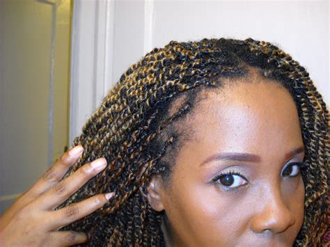 Hook the extensions over the top of the section of hair to be braided, making sure to hold the hair taut and close to the scalp. CoilyQueens™ : "Taking down your braid extensions"