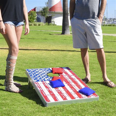 A low, fast pitch will knock an opponents bag off the board. GoSports Corn Hole Bean Bag Toss Game Set & Reviews | Wayfair