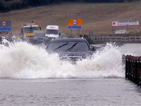 Uk Weather Supertides Spark Flood Warnings Across Country The