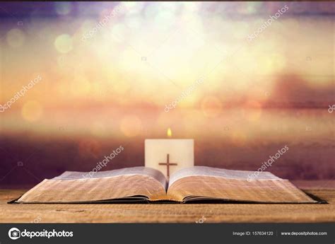 Holy Bible With Candle Stock Photo By ©billiondigital 157634120