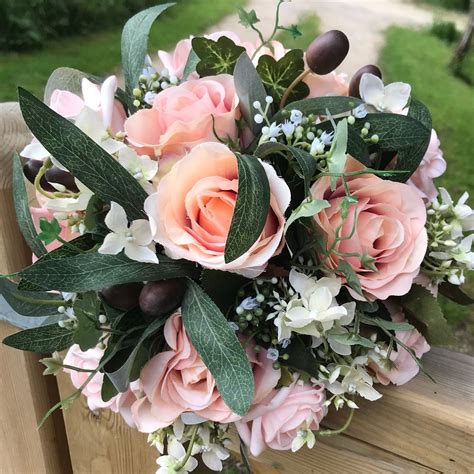 A Medium Bridal Bouquet Featuring Blush And Pink Flowers Abigailrose