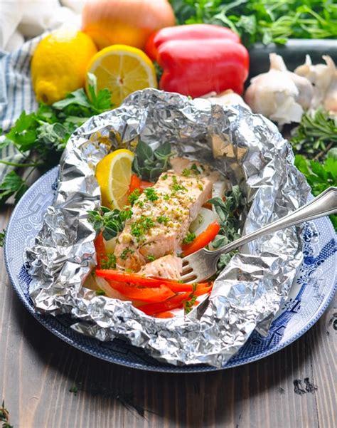 Remember that the maximum temperature you want to cook salmon to is 140f, which is fully cooked (whereas chicken is 165). Greek Salmon Baked in Foil - The Seasoned Mom