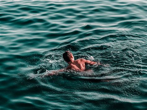 Man Swimming On Water Hd Wallpaper Peakpx