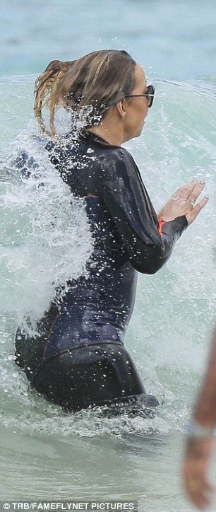 Mariah Carey Flashes Cleavage In Wetsuit With Daughter Monroe Daily Mail Online