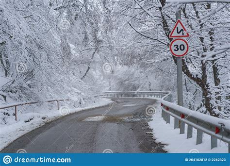 Snowy Driveway And Road Sign Speed Limit 30 Km Winter Forest After