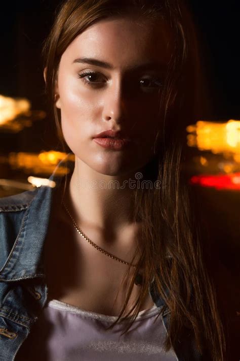 Closeup Portrait Of Amazing Brunette Model Posing With Mixed Light At