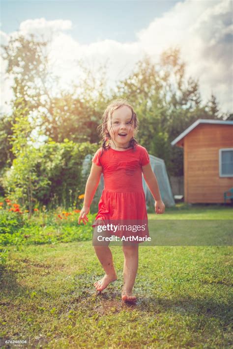 Happy Girl Playing Outdoors In Summer High Res Stock Photo Getty Images