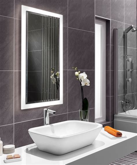 Sunburst mirrors create elegant and beautiful focal points in your living room or bedroom. Facet™ LED Lighted Mirror | The New Bevel Collection by Electric Mirror