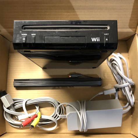 Wii Black Console With New Super Mario Brothers Wii And Music Cd
