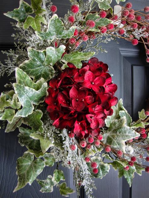 Wreaths And Home Decor A Beautiful Christmas Door Wreath With Frosted Ivy And Berries