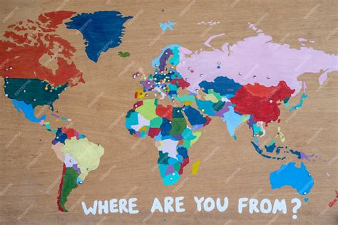 Premium Photo World Map Painted With Multicolored Paint On A Wooden