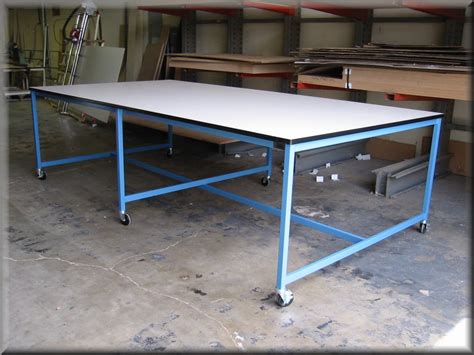 Kitchen work table on wheels. RDM - WorkBench A-109PCLG (Flat Top Table w/ Center Legs)