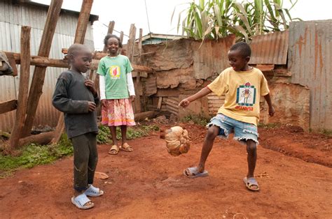 Children Playing Soccer In Africa